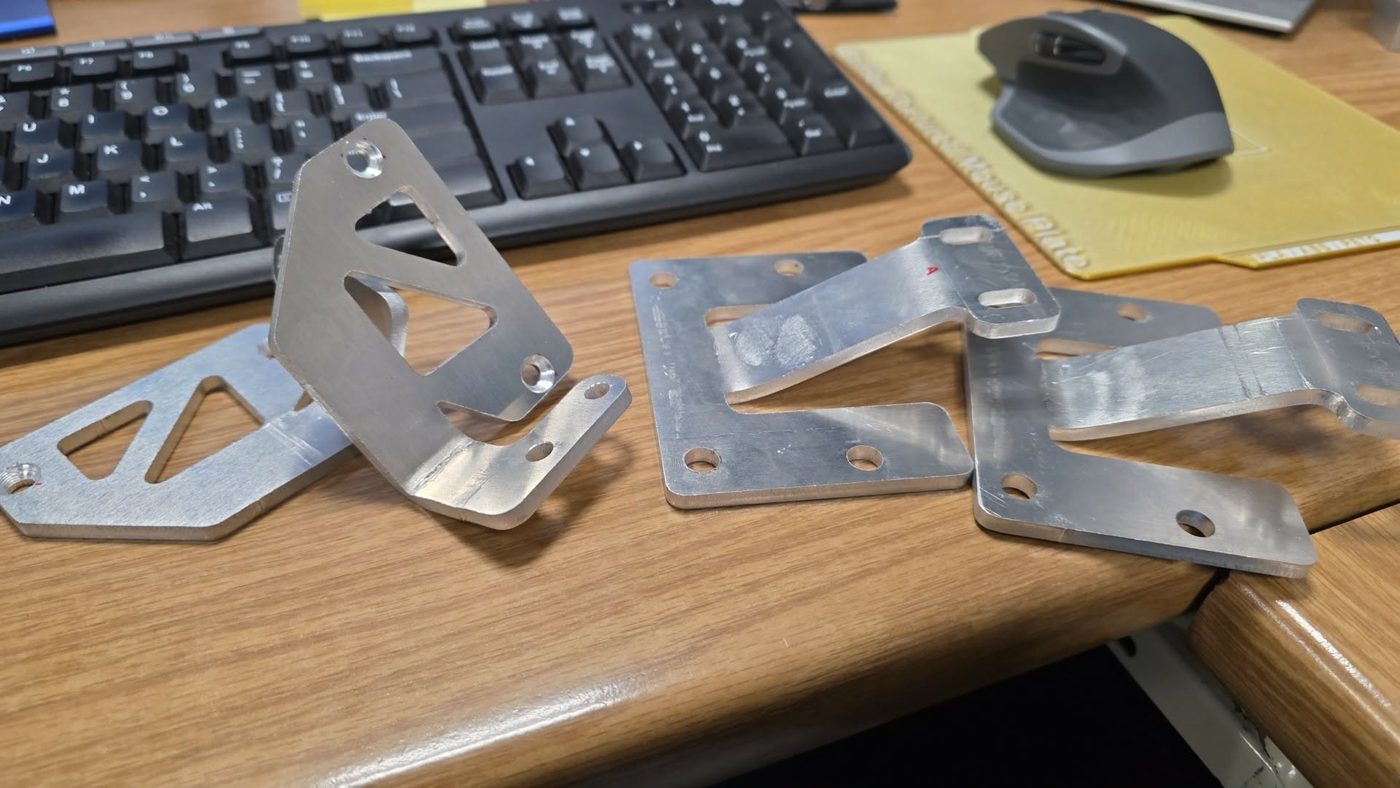 Cut and formed aluminum brackets before install