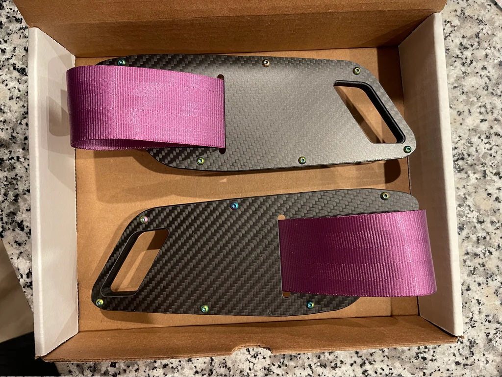 Supra GT door pull with a magenta strap
