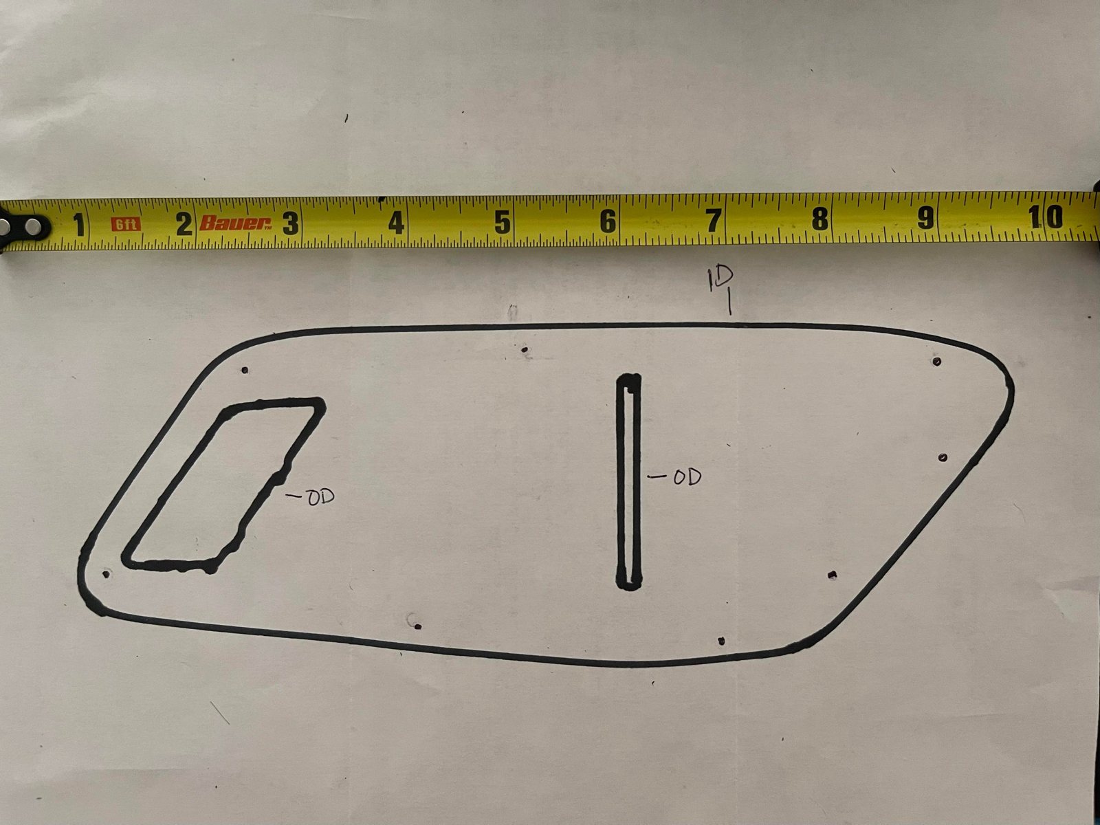 Profile, pocket and strap slot traced on paper